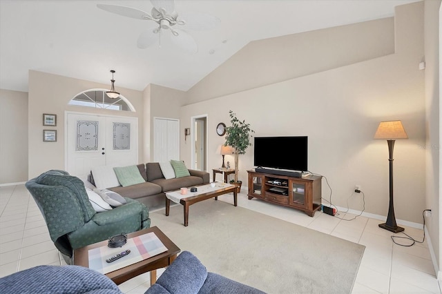 102 Marker Rd, Rotonda West, FL 33947 - living area featuring a ceiling fan, light tile patterned flooring, and vaulted ceiling