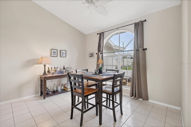 102 Marker Rd, Rotonda West, FL 33947 - dining area featuring vaulted ceiling, a ceiling fan, and light tile patterned floors