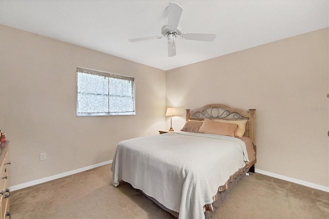 102 Marker Rd, Rotonda West, FL 33947 - bedroom with carpet and a ceiling fan