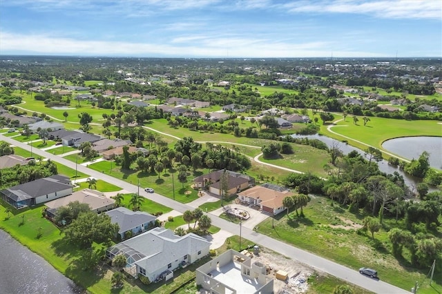 102 Marker Rd, Rotonda West, FL 33947 - aerial view of residential area featuring a large body of water and a local golf course