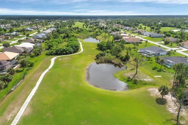 102 Marker Rd, Rotonda West, FL 33947 - aerial perspective of suburban area with a large body of water and a local golf course