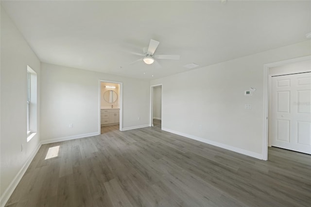238 Boundary Blvd Unit 3, Rotonda West, FL 33947 - spare room featuring wood finished floors and a ceiling fan