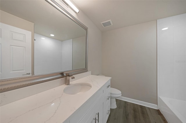 238 Boundary Blvd Unit 3, Rotonda West, FL 33947 - bathroom featuring vanity and wood finished floors