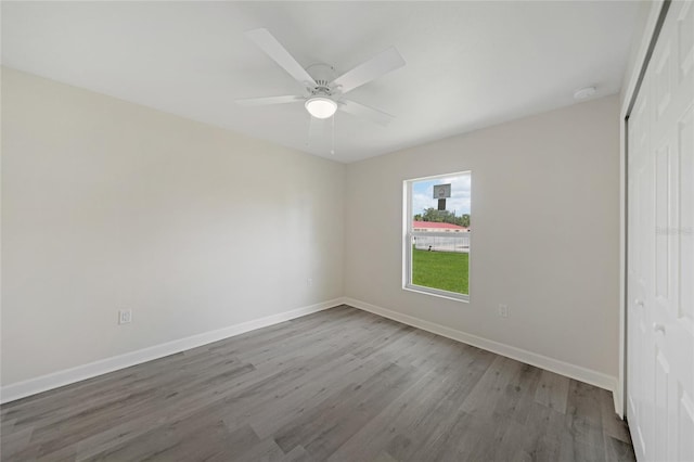 238 Boundary Blvd Unit 3, Rotonda West, FL 33947 - spare room with wood finished floors and ceiling fan