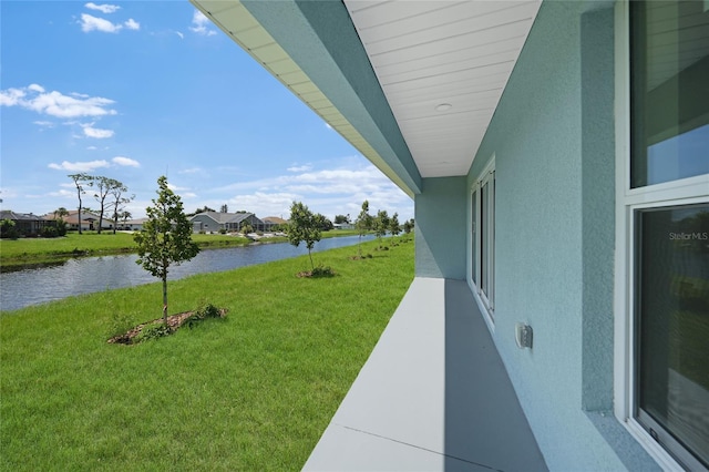 238 Boundary Blvd Unit 3, Rotonda West, FL 33947 - view of green lawn with a water view and a residential view