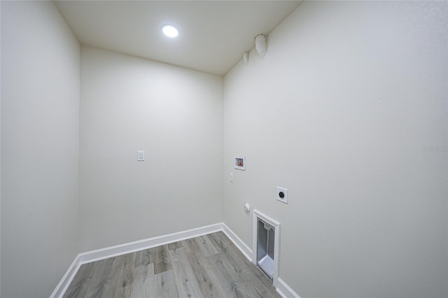238 Boundary Blvd Unit 3, Rotonda West, FL 33947 - laundry area featuring electric dryer hookup, hookup for a washing machine, light wood-type flooring, gas dryer hookup, and recessed lighting