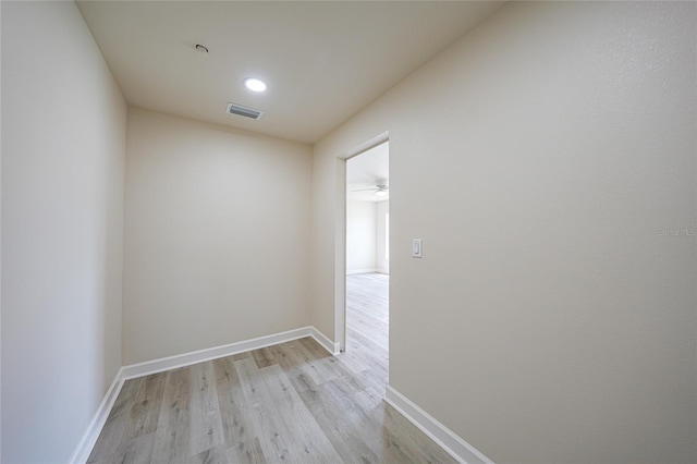 238 Boundary Blvd Unit 3, Rotonda West, FL 33947 - empty room featuring light wood finished floors and recessed lighting