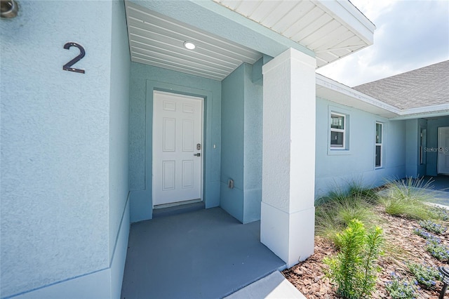 238 Boundary Blvd Unit 3, Rotonda West, FL 33947 - entrance to property featuring stucco siding