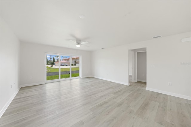 238 Boundary Blvd Unit 3, Rotonda West, FL 33947 - empty room with ceiling fan and light wood-style floors