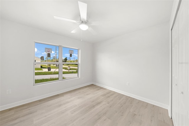 238 Boundary Blvd Unit 3, Rotonda West, FL 33947 - empty room featuring light wood-style flooring and a ceiling fan