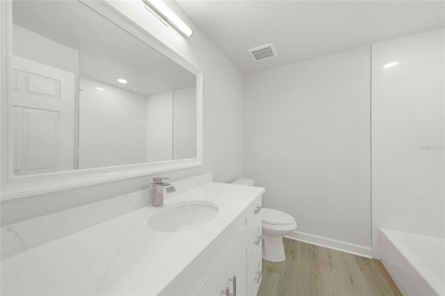 238 Boundary Blvd Unit 3, Rotonda West, FL 33947 - bathroom featuring vanity and wood finished floors