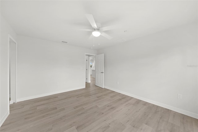 238 Boundary Blvd Unit 3, Rotonda West, FL 33947 - spare room with light wood-type flooring and a ceiling fan