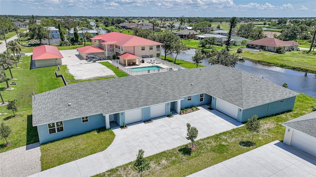 238 Boundary Blvd Unit 3, Rotonda West, FL 33947 - aerial perspective of suburban area with a large body of water