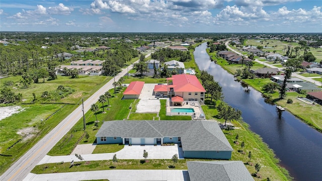 238 Boundary Blvd Unit 3, Rotonda West, FL 33947 - aerial view of residential area with a large body of water