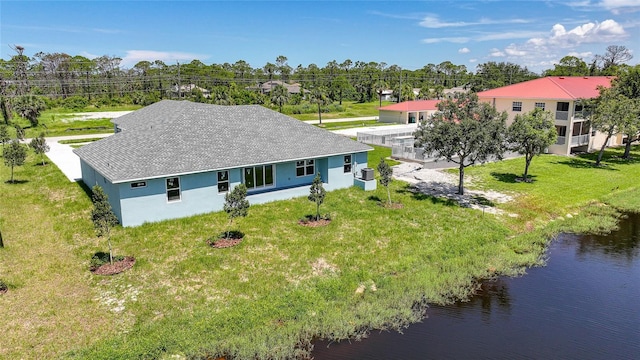 238 Boundary Blvd Unit 3, Rotonda West, FL 33947 - view of subject property featuring a nearby body of water