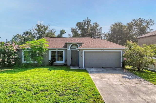 3768 Billingham Ln, North Port, FL 34288 - view of front of property featuring driveway, stucco siding, an attached garage, a front lawn, and roof with shingles
