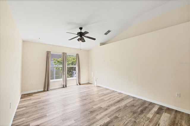 3768 Billingham Ln, North Port, FL 34288 - spare room with light wood finished floors, ceiling fan, and lofted ceiling