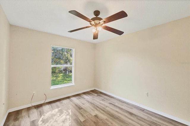 3768 Billingham Ln, North Port, FL 34288 - empty room featuring wood finished floors and a ceiling fan