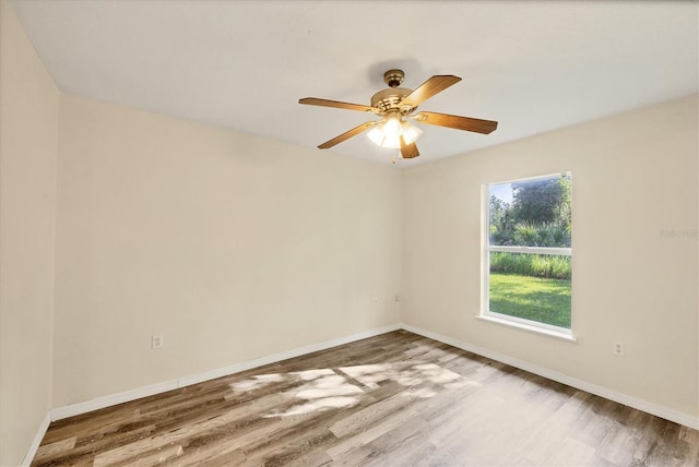 3768 Billingham Ln, North Port, FL 34288 - spare room with wood finished floors and a ceiling fan