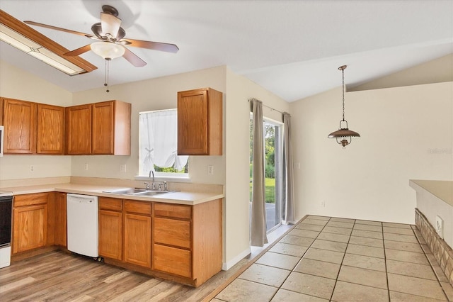 3768 Billingham Ln, North Port, FL 34288 - kitchen with white appliances, lofted ceiling, ceiling fan, light countertops, and light wood-style floors