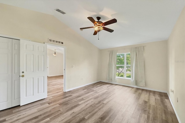 3768 Billingham Ln, North Port, FL 34288 - unfurnished bedroom with lofted ceiling, wood finished floors, a closet, and a ceiling fan