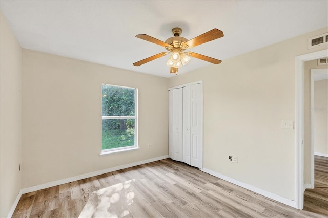 3768 Billingham Ln, North Port, FL 34288 - unfurnished bedroom featuring wood finished floors, a closet, and a ceiling fan
