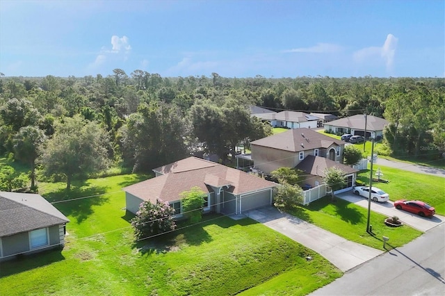 3768 Billingham Ln, North Port, FL 34288 - aerial view of residential area featuring a heavily wooded area