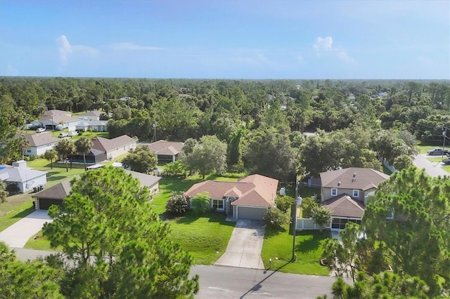 3768 Billingham Ln, North Port, FL 34288 - aerial perspective of suburban area with a heavily wooded area