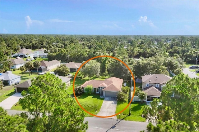 3768 Billingham Ln, North Port, FL 34288 - aerial perspective of suburban area with a forest
