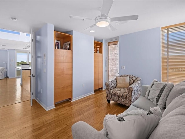 8041 Bay Pointe Dr, Englewood, FL 34224 - living room with a ceiling fan and wood finished floors