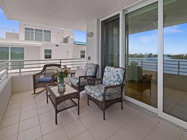 8041 Bay Pointe Dr, Englewood, FL 34224 - balcony with a water view and an outdoor hangout area