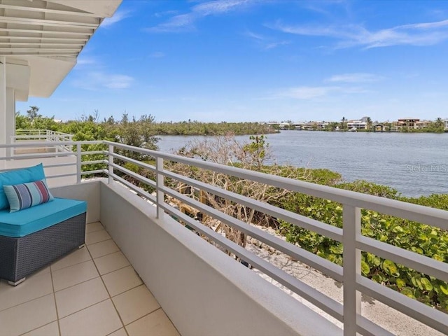 8041 Bay Pointe Dr, Englewood, FL 34224 - balcony featuring a water view
