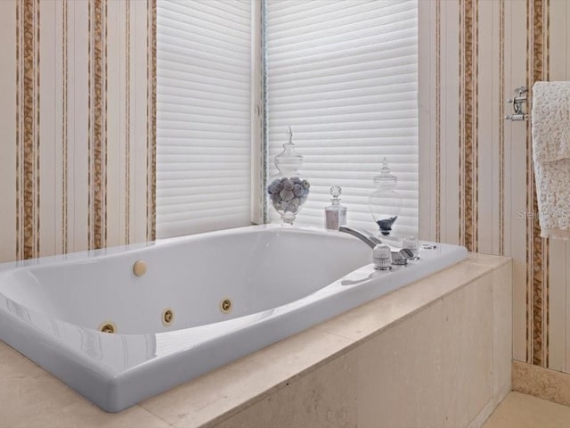 8041 Bay Pointe Dr, Englewood, FL 34224 - bathroom with a tub with jets
