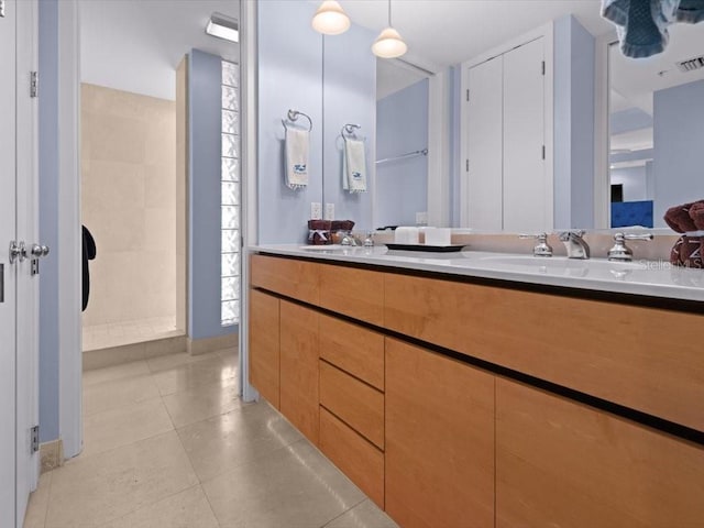 8041 Bay Pointe Dr, Englewood, FL 34224 - full bathroom with double vanity and tile patterned floors