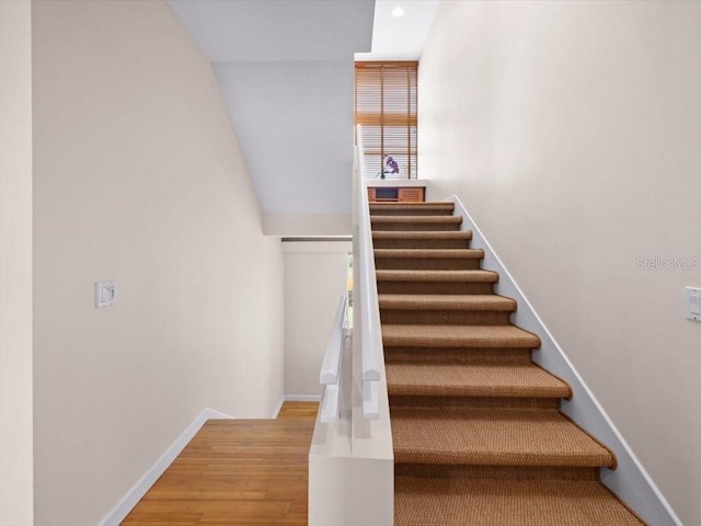 8041 Bay Pointe Dr, Englewood, FL 34224 - stairs featuring wood finished floors and recessed lighting
