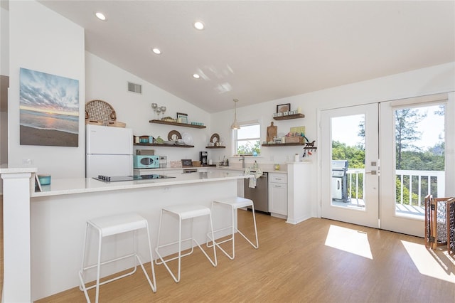 100 S Gulf Blvd, Placida, FL 33946 - kitchen with open shelves, stainless steel appliances, french doors, recessed lighting, and lofted ceiling