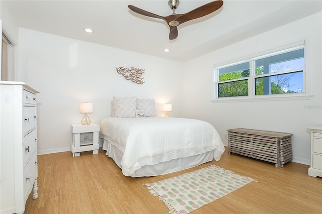 100 S Gulf Blvd, Placida, FL 33946 - bedroom with light wood-style flooring, recessed lighting, and ceiling fan