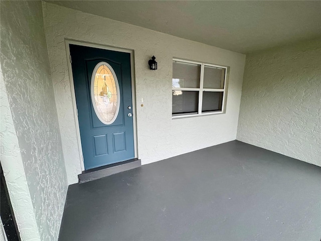 26591 Fairway Dr Unit A & B, Punta Gorda, FL 33982 - doorway to property with stucco siding