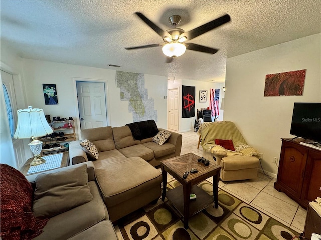 26591 Fairway Dr Unit A & B, Punta Gorda, FL 33982 - living area featuring ceiling fan, light tile patterned floors, and a textured ceiling
