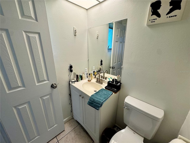 26591 Fairway Dr Unit A & B, Punta Gorda, FL 33982 - half bathroom with vanity and tile patterned flooring