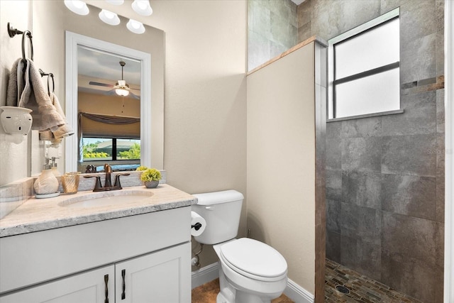 15044 San Domingo Blvd, Port Charlotte, FL 33981 - bathroom with vanity, tiled shower, and ceiling fan