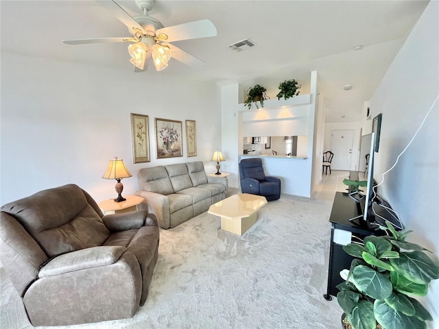 11644 SW Egret Cir Unit 905, Lake Suzy, FL 34269 - living room featuring light colored carpet and ceiling fan