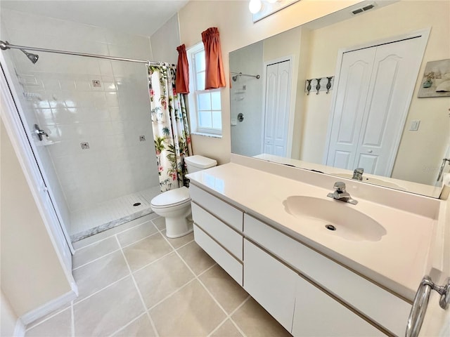 11644 SW Egret Cir Unit 905, Lake Suzy, FL 34269 - full bath with vanity, a tile shower, and tile patterned flooring