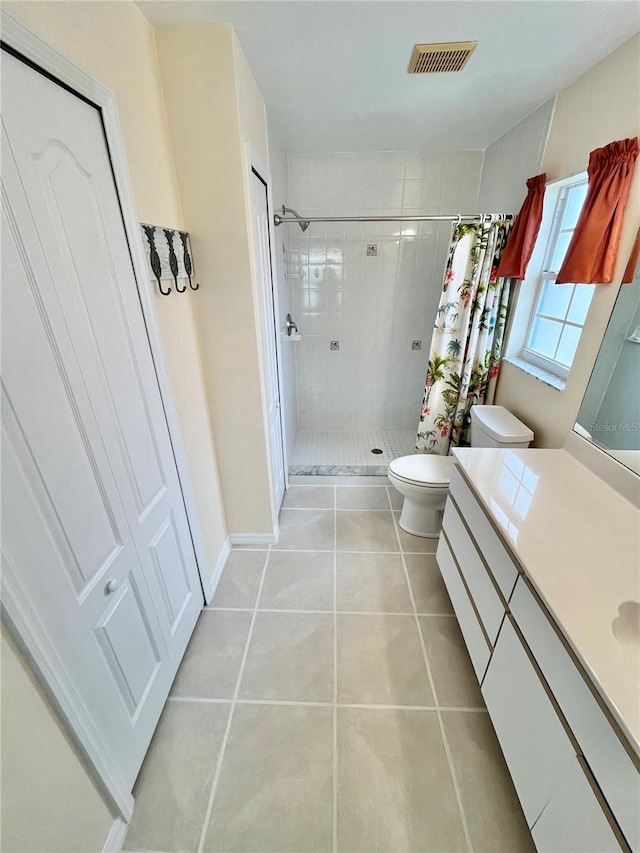 11644 SW Egret Cir Unit 905, Lake Suzy, FL 34269 - bathroom with a stall shower, vanity, and tile patterned floors
