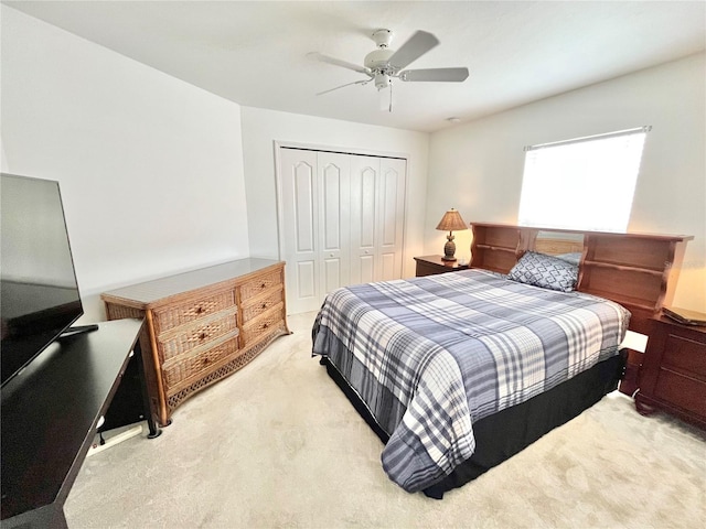 11644 SW Egret Cir Unit 905, Lake Suzy, FL 34269 - carpeted bedroom with a closet and a ceiling fan