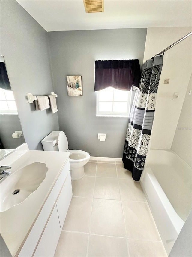 11644 SW Egret Cir Unit 905, Lake Suzy, FL 34269 - bathroom featuring vanity, shower / tub combo, and tile patterned flooring