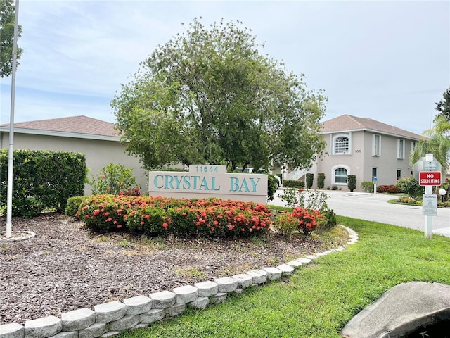11644 SW Egret Cir Unit 905, Lake Suzy, FL 34269 - community sign with a lawn