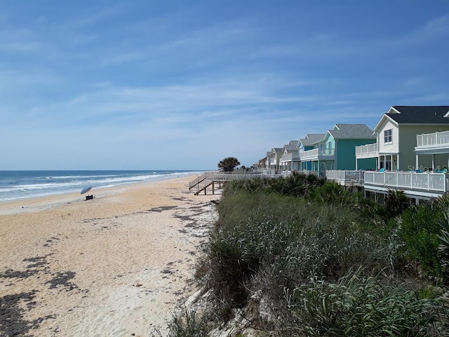 view of water feature with a beach view