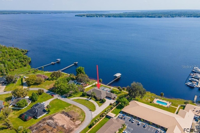 drone / aerial view with a water view