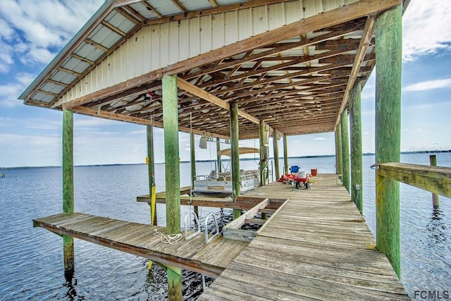 view of dock with a water view